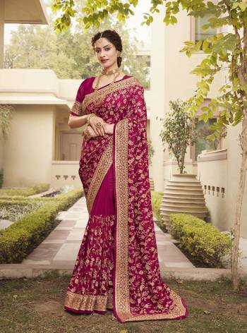 Celebrate This Festive Season In This Very Pretty Wine Colored Designer Saree Paired With Blouse. This Saree and Blouse Are Vichitra Silk Based Beautified With Detailed Heavy Embroidery And Diamond Work. 