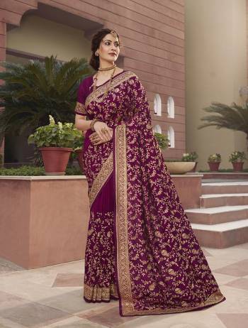 Celebrate This Festive Season In This Very Pretty Burgundy Colored Designer Saree Paired With Blouse. This Saree and Blouse Are Vichitra Silk Based Beautified With Detailed Heavy Embroidery And Diamond Work. 