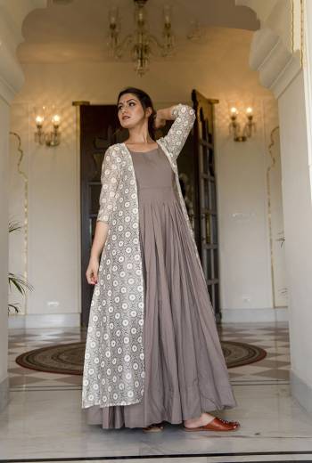 Flaunt Your Rich And Elegant Taste Wearing This Designer Readymade Long Gown In Grey Color And Jacket In Silver Grey Color. This  Pretty Gown Is Fabricated On Maslin Beautified And Jacket Is Chanderi Silk Are Digital Print . Its Fabric Is Soft Towards Skin And Easy To Carry All Day Long. 