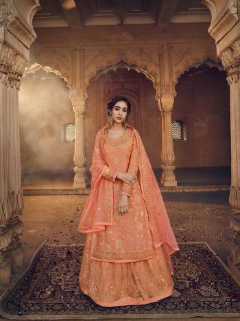 Look Pretty In This Heavy Designer Lehenga Choli In All Over Fine Color. Its Blouse Are Dola Jacquard Wevon And Lehenga Are Fabricated On Net Paired With Net Fabricated Dupatta. It Is Beautified With Heavy Embroidery And Diamond Work Giving It An Attractive Look.

