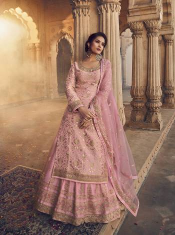 Look Pretty In This Heavy Designer Lehenga Choli In All Over Fine Color. Its Blouse Are Dola Jacquard Wevon And Lehenga Are Fabricated On Net Paired With Net Fabricated Dupatta. It Is Beautified With Heavy Embroidery And Diamond Work Giving It An Attractive Look.

