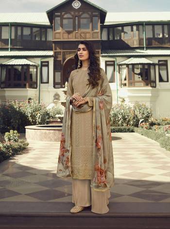 Look Pretty This Designer Long Suit In Lovely Beige Color.?Its Pretty Embroidred,Lakhnovi Work And Ston Work Top Is Georgette Based Paired With Santoon Bottom And Georgette Fabricated Digital Print Dupatta Which Gives An Attractive To The Suit.