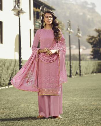 Look Pretty This Designer Long Suit In Lovely Onion Pink Color.?Its Pretty Embroidred,Lakhnovi Work And Ston Work Top Is Georgette Based Paired With Santoon Bottom And Georgette Fabricated Digital Print Dupatta Which Gives An Attractive To The Suit.