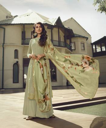 Look Pretty This Designer Long Suit In Lovely Olive Green Color.?Its Pretty Embroidred,Lakhnovi Work And Ston Work Top Is Georgette Based Paired With Santoon Bottom And Georgette Fabricated Digital Print Dupatta Which Gives An Attractive To The Suit.