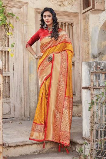 Adorn The Pretty Angelic Look Wearing This Heavy Wevon Designer Saree In Fine Color Paired With Contrasting  Colored Blouse. This Saree Is Fabricated On Silk Paired With Silk Fabricated Blouse. Its Pretty Color Pallete Will Give An Attractive Look To Your Personality. 