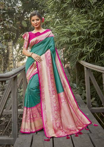 Celebrate This Festive Season In This Very Pretty Colored Designer Saree Paired With Contrasting Colored Blouse. This Saree and Blouse Silk Based Beautified With Detailed Wevon Jari Jacquard Work. 