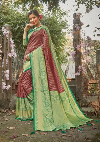 Celebrate This Festive Season In This Very Pretty Colored Designer Saree Paired With Contrasting Colored Blouse. This Saree and Blouse Silk Based Beautified With Detailed Wevon Jari Jacquard Work. 