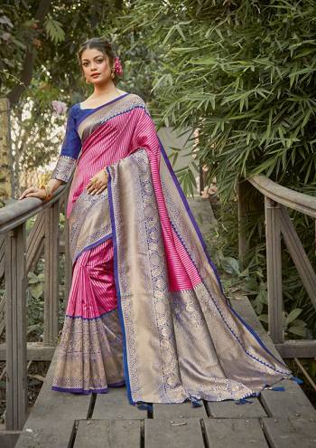 Celebrate This Festive Season In This Very Pretty Colored Designer Saree Paired With Contrasting Colored Blouse. This Saree and Blouse Silk Based Beautified With Detailed Wevon Jari Jacquard Work. 