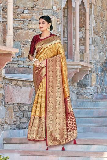 Celebrate This Festive Season In This Very Pretty Colored Designer Saree Paired With Contrasting Colored Blouse. This Saree and Blouse Silk Based Beautified With Detailed Wevon Jari Jacquard Work. 