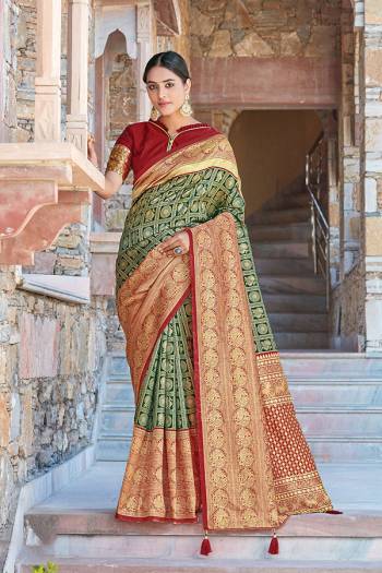 Celebrate This Festive Season In This Very Pretty Colored Designer Saree Paired With Contrasting Colored Blouse. This Saree and Blouse Silk Based Beautified With Detailed Wevon Jari Jacquard Work. 