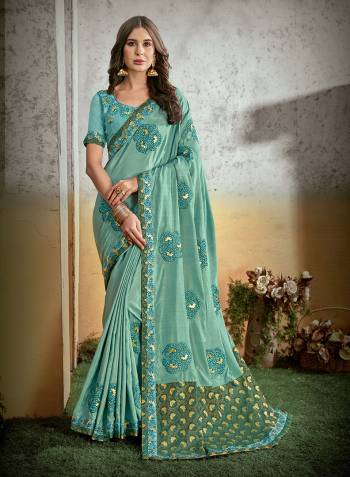 Look Attractive Wearing This Pistel Colored Saree Paired With Maching Colored Blouse.  This Heavy Designer Saree Is Banarasi Pallu & Vichitra Silk Based Which Gives A Rich Look To Your Personality With Embroidery Work Blouse. Buy This Pretty Saree Now.