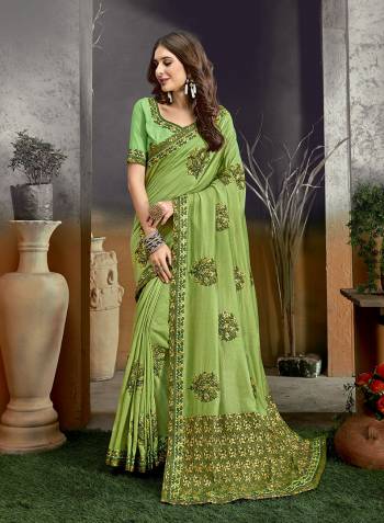 Look Attractive Wearing This Pistel Colored Saree Paired With Maching Colored Blouse.  This Heavy Designer Saree Is Banarasi Pallu & Vichitra Silk Based Which Gives A Rich Look To Your Personality With Embroidery Work Blouse. Buy This Pretty Saree Now.