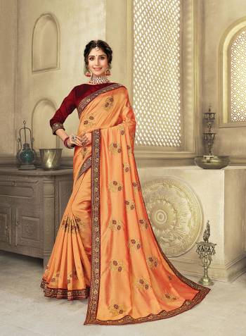 Adorn The Pretty Angelic Look Wearing This Heavy Designer Embroidery Butti Saree In Dusty Color Paired With Contrasting Colored Blouse. This Saree Is Fabricated On Vichitra  Silk Paired With Art Silk Fabricated Blouse. Its Pretty Color Pallete Will Give An Attractive Look To Your Personality. 