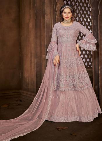 Look Pretty This Designer Floor Length Suit In Lovely Pink Color.?Its Pretty Embroidred And Stone Work Top And Bottom Is Net Based Paired With And Net Fabricated Embroidered With Stone Work Dupatta Which Gives An Attractive To The Suit.