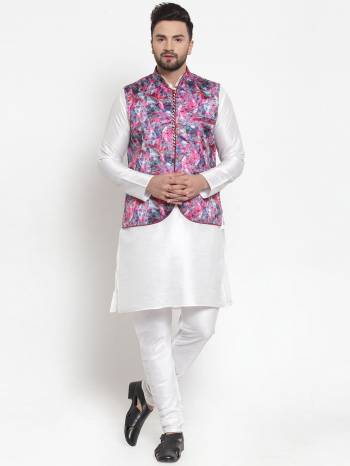 Here Is A Rich And Decent Looking Readymade Pair Of Men's Kurta Pyjama With Jacket. This Kurta And Pyjama Are Fabricated On Raw Silk Paired With Satin Printed Fabricated Jacket. Buy This Pair For The Upcoming Wedding And Festive Season. 

