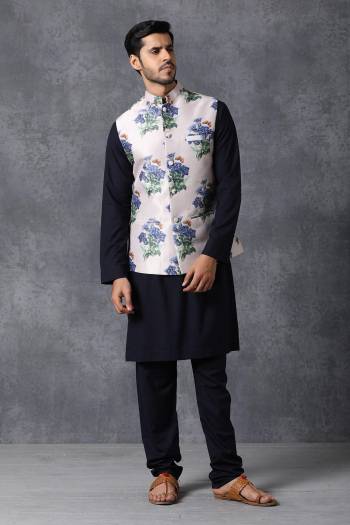 Here Is A Rich And Decent Looking Readymade Pair Of Men's Kurta Pyjama With Jacket. This Kurta And Pyjama Are Fabricated On Cotton Paired With Satin Printed Fabricated Jacket. Buy This Pair For The Upcoming Wedding And Festive Season. 

