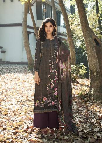 This Designer Suit In Lovely  Color.?Its Pretty Digital Printed Top Is Crepe Based Paired With Crepe Bottom And Georgette Fabricated Digital Printed Dupatta Which Gives An Attractive To The Suit.