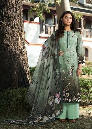 This Designer Suit In Lovely  Color.?Its Pretty Digital Printed Top Is Crepe Based Paired With Crepe Bottom And Georgette Fabricated Digital Printed Dupatta Which Gives An Attractive To The Suit.