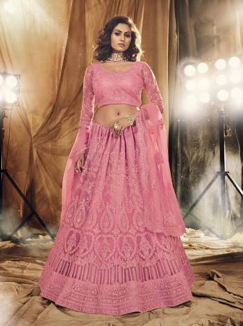 This Wedding Season Heavy Designer Lehenga Choli In Pink Color Fabricated On Net Beautified With Heavy Attractive Cording Embroidery With Dupatta. 