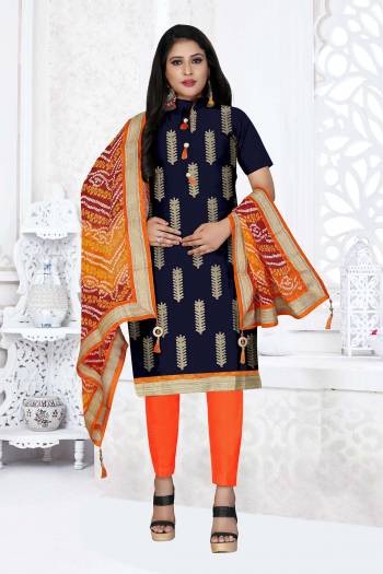 Grab This Very Beautiful And Elegant Looking Designer Straight Suit In Nevy Blue Color Paired With Orange Colored Bottom And Dupatta. Its Pretty Elegant Embroidered Top Is Fabricated On Glass Cotton Paired With Cotton Bottom and Georgette Fabricated Bandhani Printed Dupatta. 

