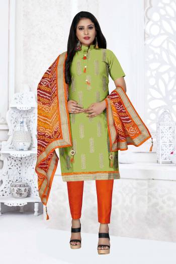 Grab This Very Beautiful And Elegant Looking Designer Straight Suit In Green Color Paired With Orange Colored Bottom And Dupatta. Its Pretty Elegant Embroidered Top Is Fabricated On Glass Cotton Paired With Cotton Bottom and Georgette Fabricated Bandhani Printed Dupatta. 

