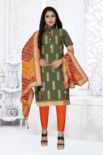 Grab This Very Beautiful And Elegant Looking Designer Straight Suit In Mehendi Color Paired With Orange Colored Bottom And Dupatta. Its Pretty Elegant Embroidered Top Is Fabricated On Glass Cotton Paired With Cotton Bottom and Georgette Fabricated Bandhani Printed Dupatta. 

