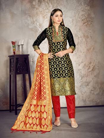 Here Is A Rich And Elegant Looking Silk Based Straight Suit In Dark Colored Top Paired With Matching Colored Bottom And Dupatta. Its Top And Dupatta Are Fabricated On Banarasi Silk Paired with Art Silk Bottom.

