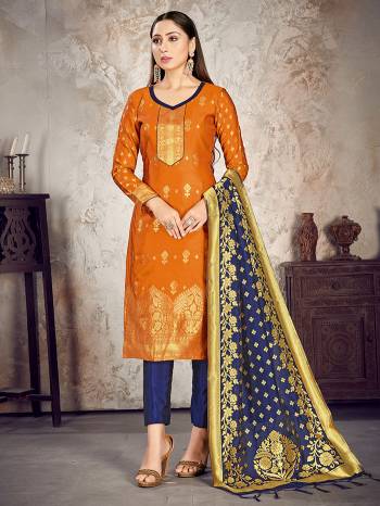 Here Is A Rich And Elegant Looking Silk Based Straight Suit In Dark Colored Top Paired With Matching Colored Bottom And Dupatta. Its Top And Dupatta Are Fabricated On Banarasi Silk Paired with Art Silk Bottom.

