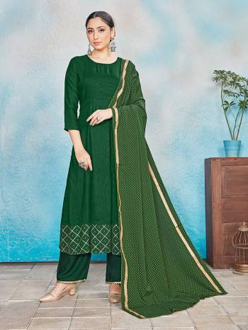 Simple and Elegant Looking Pretty Readymade Suits Is Here In Green Colored Top Bottom And Dupatta. Its Top IS Fabricated On Rayon Paired With Rayon Bottom And Dupatta With Foil Print. All Its Fabric Are Light Weight And Easy To Carry all Day Long. 

