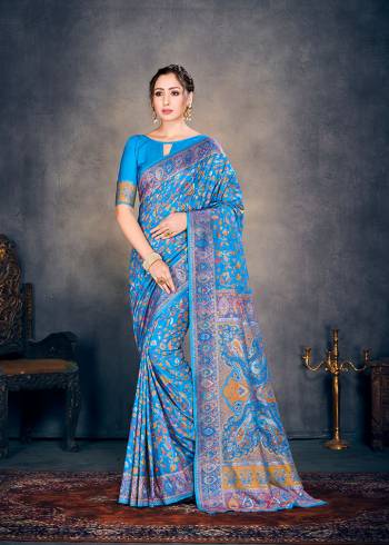 Celebrate This Festive Season In This Very Pretty Sky Blue Colored Designer Saree Paired With Blouse. This Saree and Blouse Are Cotton Silk Based Beautified With Detailed Woven Jacquard Designer Party Wear Saree. 