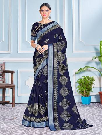 This Festive Season In This Very Pretty Nevy Blue Colored Designer Saree Paired With Blouse. This Saree and Blouse Are Cotton Silk Based Beautified With Detailed Designer Printed Saree.  