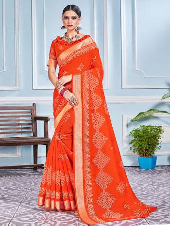 This Festive Season In This Very Pretty Orange Colored Designer Saree Paired With Blouse. This Saree and Blouse Are Cotton Silk Based Beautified With Detailed Designer Printed Saree.  