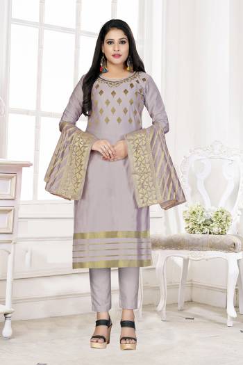 Rich And Elegant Looking Cotton Based Straight Suit In Light Colored Top Bottom And Dupatta. Its Top Are Cotton Wevon Fabricated And Dupatta Are Banarasi Jacquard Wevon Fabricated with Cotton Bottom. 