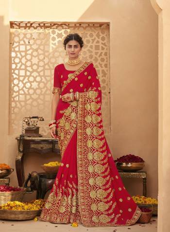 Celebrate This Wedding Festive Season In This Very Pretty Red Colored Designer Saree Paired With Matching Colored Blouse. This Saree and Blouse Are Heavy Blooming Georgette Based Beautified With Detailed Heavy Embroidery And Diamond Work. 