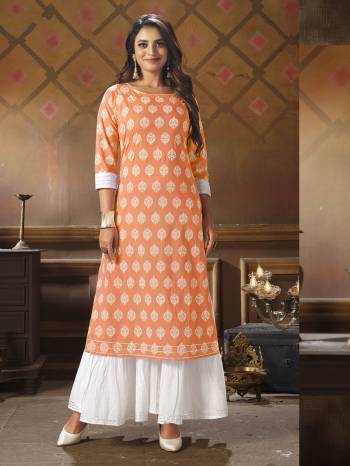 This Readymade Long Kurti And Sarara In Light Color Fabricated On Cotton Beautified With Fine Printed. It Is Light In Weight And Easy To Carry All Day Long. 