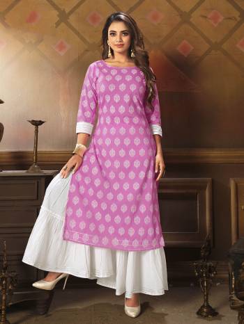 This Readymade Long Kurti And Sarara In Light Color Fabricated On Cotton Beautified With Fine Printed. It Is Light In Weight And Easy To Carry All Day Long. 