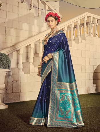 Look Attractive Wearing This Nevy Blue Colored Saree Paired With Nevy Blue Colored Blouse.  This Heavy Designer Saree Is Banarasi Silk Wevon Jacquard Based Which Gives A Rich Look To Your Personality. Buy This Pretty Saree Now.