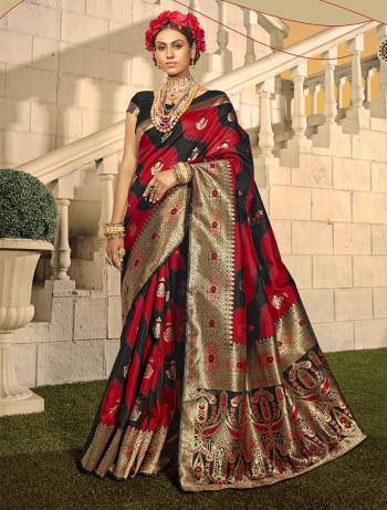 Look Attractive Wearing This Black Colored Saree Paired With Black Colored Blouse.  This Heavy Designer Saree Is Banarasi Silk Wevon Jacquard Based Which Gives A Rich Look To Your Personality. Buy This Pretty Saree Now.