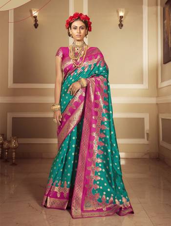 Look Attractive Wearing This Rama Colored Saree Paired With Pink Colored Blouse.  This Heavy Designer Saree Is Banarasi Silk Wevon Jacquard Based Which Gives A Rich Look To Your Personality. Buy This Pretty Saree Now.