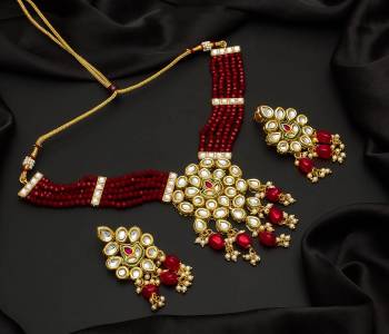 Give An Enhanced Look To Your Personality By Pairing Up This Beautiful Necklace Set With Your Ethnic Attire. This Pretty Set Is In Color Beautified With Pearl And Stone Work. Buy Now.