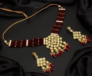 Give An Enhanced Look To Your Personality By Pairing Up This Beautiful Necklace Set With Your Ethnic Attire. This Pretty Set Is In Color Beautified With Pearl And Stone Work. Buy Now.