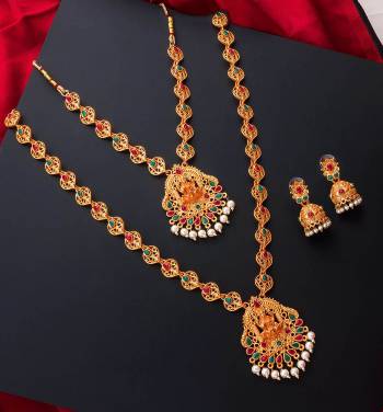 An Enhanced Look To Your Personality By Pairing Up This Beautiful Necklace Set With Your Ethnic Attire. This Pretty Set Is In Gold Color Beautified With Temple Work. Buy Now.