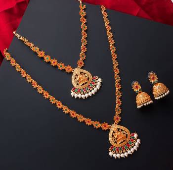 An Enhanced Look To Your Personality By Pairing Up This Beautiful Necklace Set With Your Ethnic Attire. This Pretty Set Is In Gold Color Beautified With Temple Work. Buy Now.