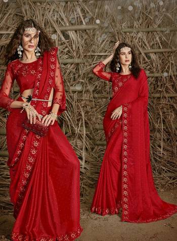 Celebrate This Festive Season In This Very Pretty Red Colored Designer Saree Paired With Blouse. This Saree and Blouse Are Chiffon Based Beautified With Detailed Cut Work Heavy Embroidery And Machine Diamond Work. 