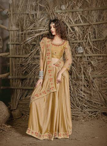 Celebrate This Festive Season In This Very Pretty Beige Colored Designer Saree Paired With Blouse. This Saree and Blouse Are Chiffon Based Beautified With Detailed Cut Work Heavy Embroidery And Machine Diamond Work. 