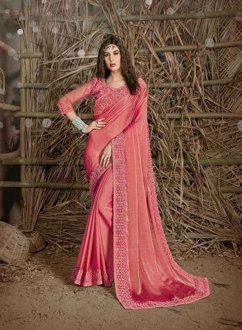 Celebrate This Festive Season In This Very Pretty Pink Colored Designer Saree Paired With Blouse. This Saree and Blouse Are Chiffon Based Beautified With Detailed Cut Work Heavy Embroidery And Machine Diamond Work. 