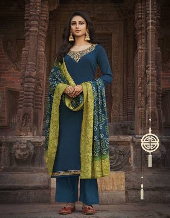 Grab This Very Beautiful Designer Straight Suit In Fine Color Paired With Pretty Embroidered And Diamond Work And Maching Colored Dupatta Are Digital Print. Its Top Is Fabricated On Chinon Chiffon Paired With Dull Santoon Bottom and Chinon Chiffon Fabricated Dupatta. Buy This Designer Embroidered Suit Now. 

