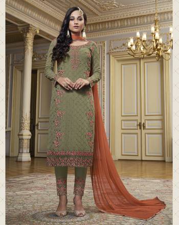 This Festive And Wedding Season, Be The Most Beautiful Diva Wearing This Designer Straight Suit In Fine Color. Its Embroidered With Hand WorkTop Is Fabricated on Georgette Paired With Santoon Work Bottom And Chiffon Swarovski  Dupatta. Buy Now. 

