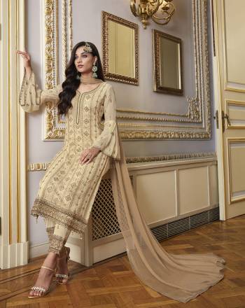 This Festive And Wedding Season, Be The Most Beautiful Diva Wearing This Designer Straight Suit In Fine Color. Its Embroidered With Hand WorkTop Is Fabricated on Georgette Paired With Santoon Work Bottom And Chiffon Swarovski  Dupatta. Buy Now. 

