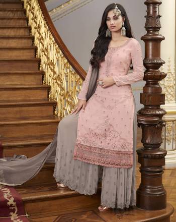 This Festive And Wedding Season, Be The Most Beautiful Diva Wearing This Designer Straight Suit In Fine Color. Its Embroidered With Hand WorkTop Is Fabricated on Georgette Paired With Santoon Work Bottom And Chiffon Swarovski  Dupatta. Buy Now. 

